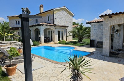 Renovated Istrian stone house with pool and sea view